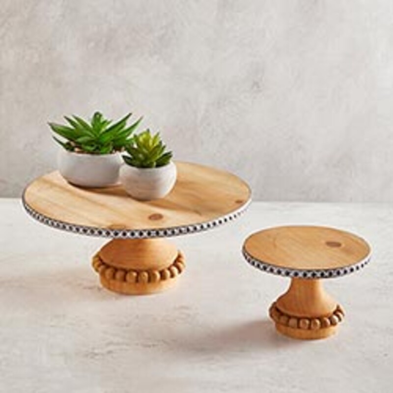 Wooden Cake Stand  XLarge<br />
Item #BMR244<br />
Stylish cake stand makes a perfect center piece for your table. It will compliment the cake, pastries as well as your home décor.<br />
Versatile cake stands can also be used as a riser for home décor<br />
Easy care<br />
Material: Wood<br />
Size: 14Dia x 5.75H<br />
Care Instructions: Spot Clean Only<br />
UPC: 886083974465